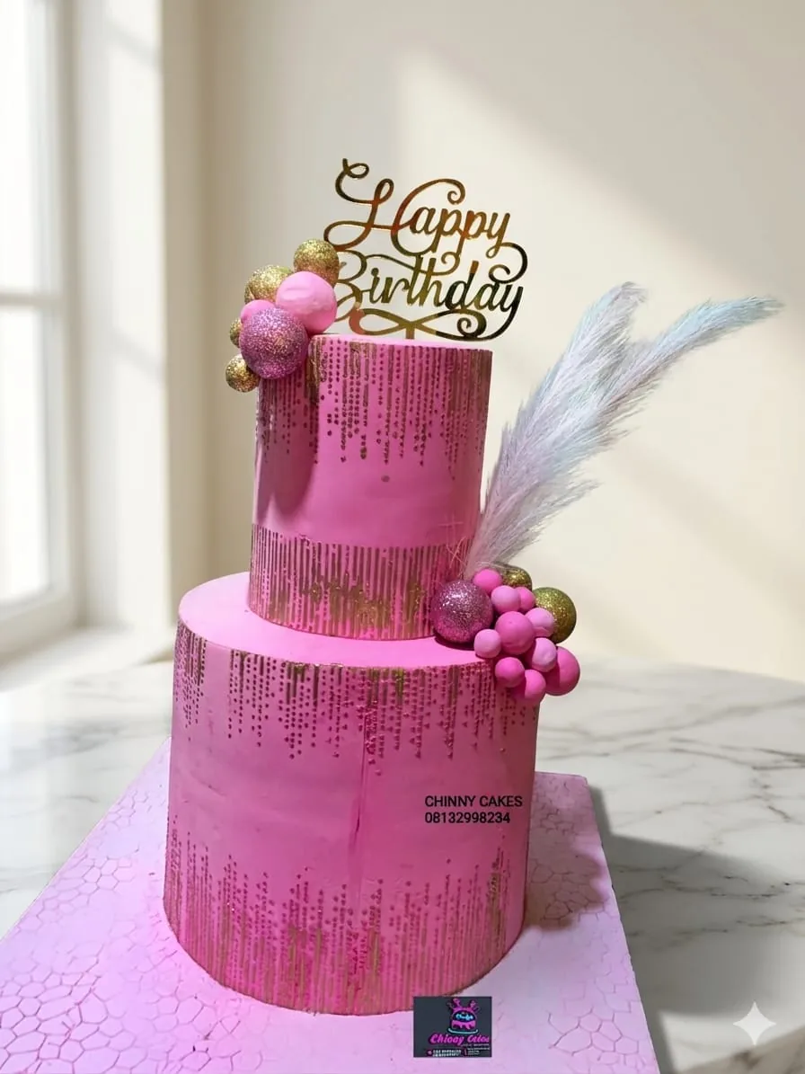 Two-tier pink birthday cake by Chinny Cakes & More