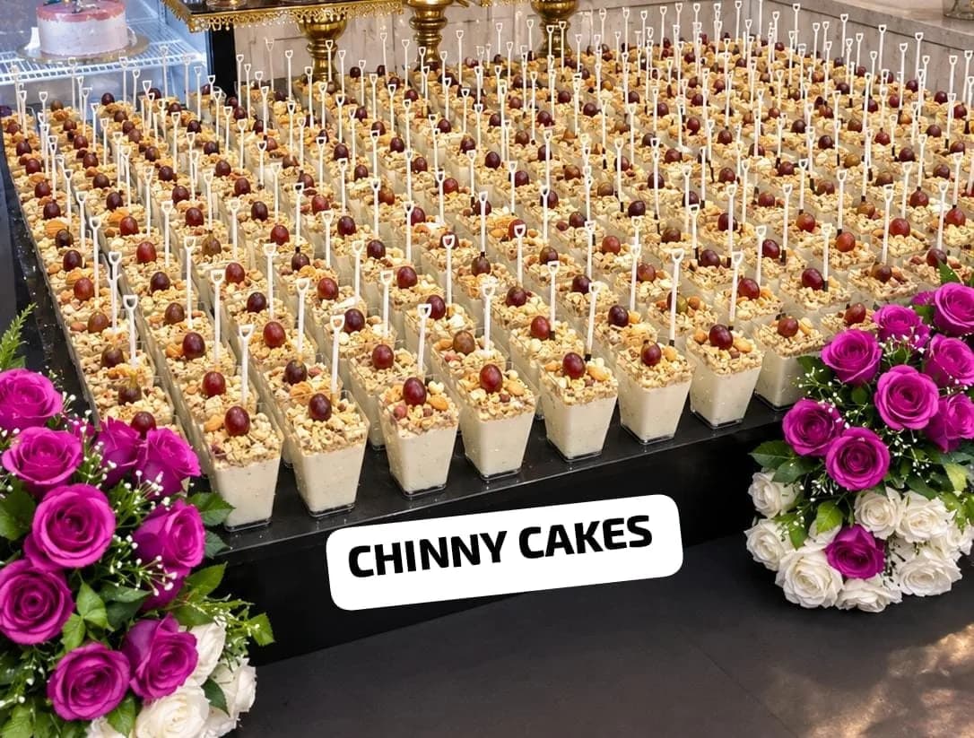Large arrangement of individual dessert cups prepared for an event